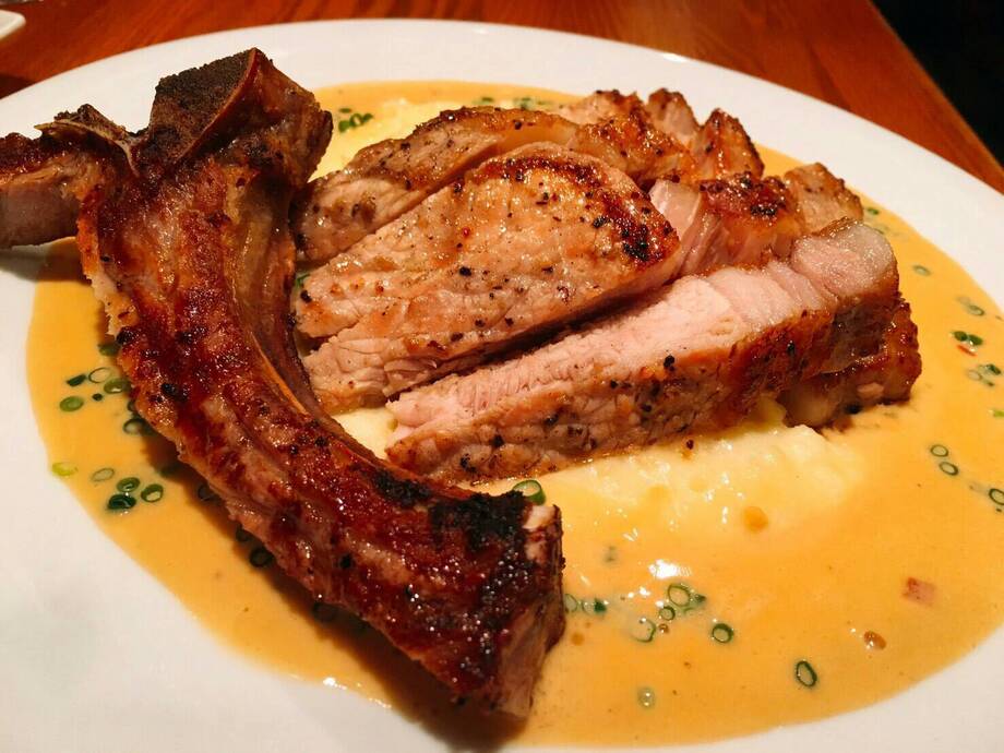 群馬県産骨付きもち豚の炭火焼き　マッシュポテトとガーリックレモンバターソース ( Charcoal griled Pork Chop with Mashed Potato and Garlic Lemon Butter Sause)