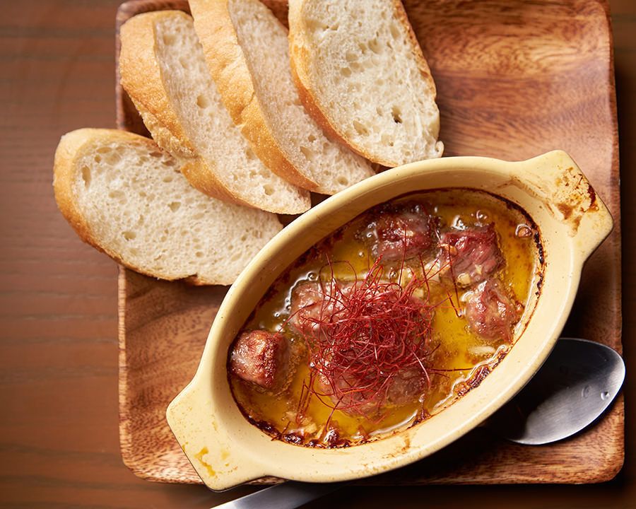 サーロインステーキのアヒージョ（￥７８０）