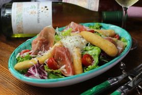 Fried pizza with Raw ham & Soft boiled Egg